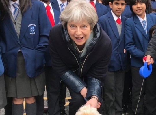Theresa May Visits Her Childhood Primary School In East London
