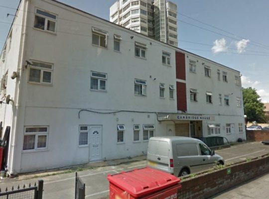A couple who illegally turned an office block into flats fined £86,000