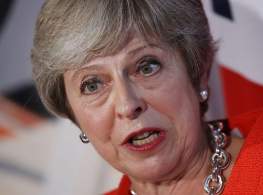 Theresa May In  Brexit No Deal Corridor
