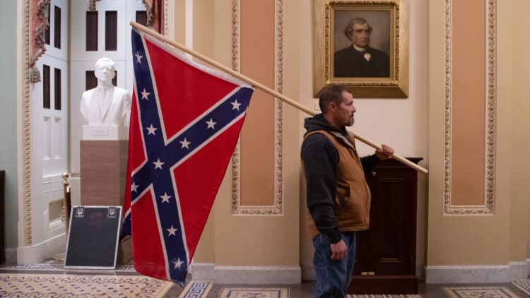 FBI Arrest Man Carrying Confederate Flag During Capitol Hill Siege