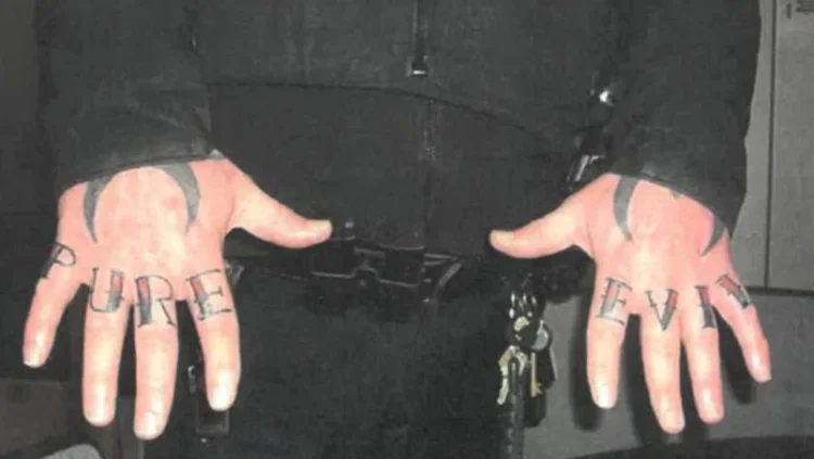 Irresponsible U.S Cop Fired From Department After Having Words Pure Evil Tattoed Across Fingers