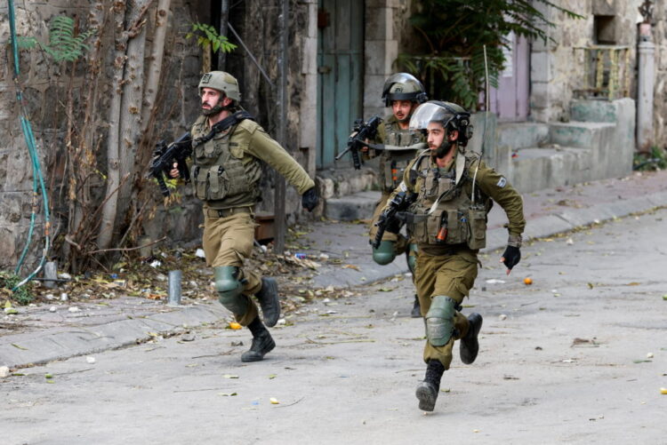 Israeli Troops wickedly kill two Palestinians after they appear to surrender