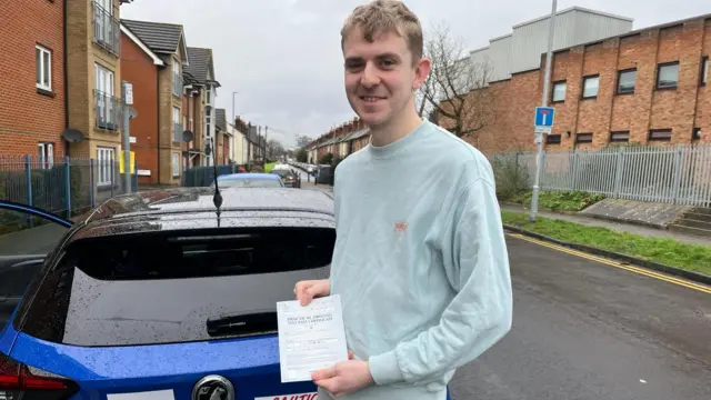 Young drivers in Britain express anger after months-long test delays