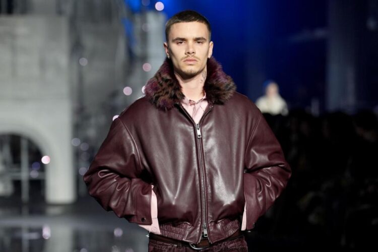 Romeo Beckham and Rosie Huntington-Whiteley Shine On Catwalk At London Fashion Week