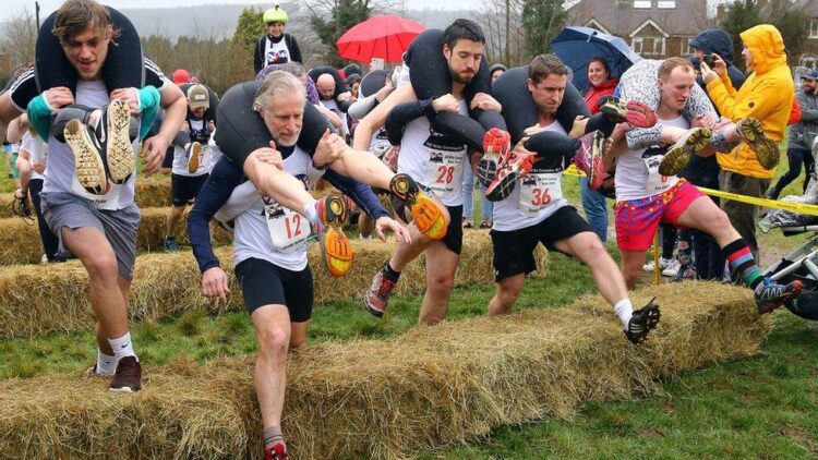 Finnish Duo Triumph At The UK Wife‑Carrying Race