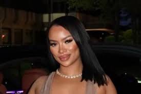 X Factor Finalist Facing Attempted Murder Charge makes heart sign from dock