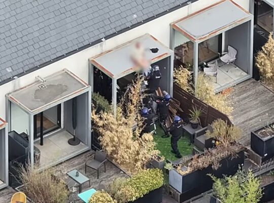 Dramatic End To 48 Hour Salford Standoff As Police Pull wanted Man from Roof Whilst He Slept